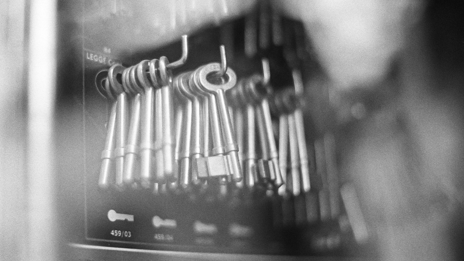 Image of keys seen through a shop window